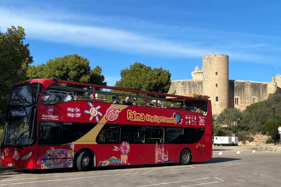 Palma city sightseeing bus at Bellver Castle Mallorca